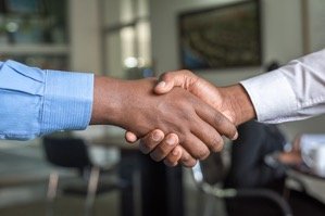 Recruiter and candidate shaking hands.